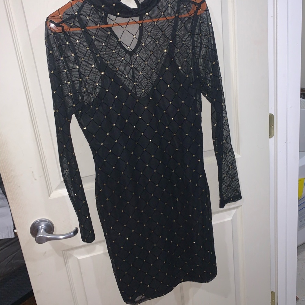 Black sheer dress with gold sparkle accents